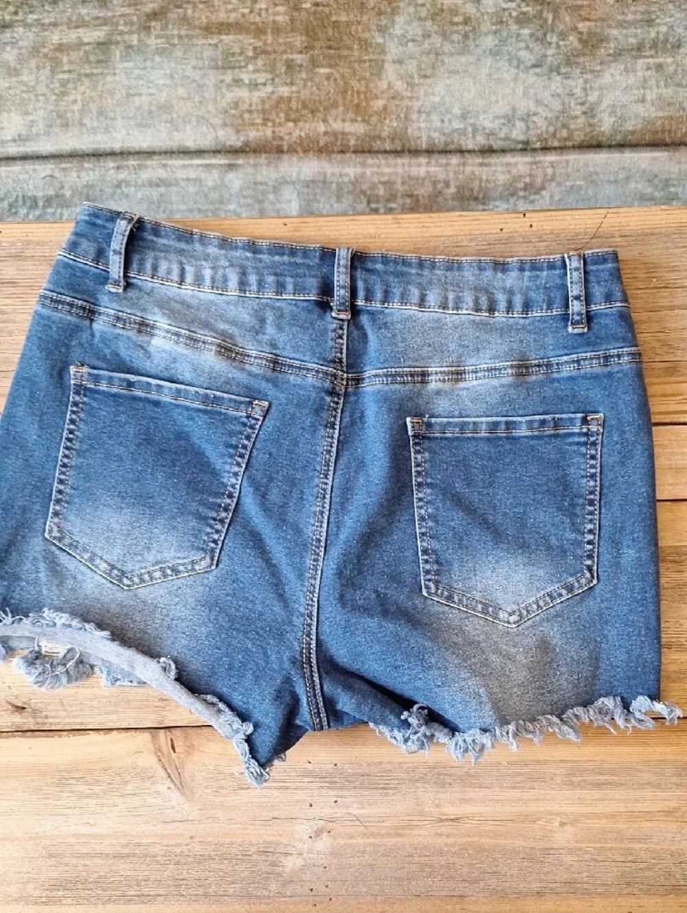 Women’s Dark Blue Distressed Denim Shorts. Large